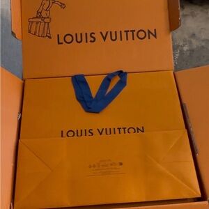 Louis Vuitton Vibrant Orange Bag with Blue Handles